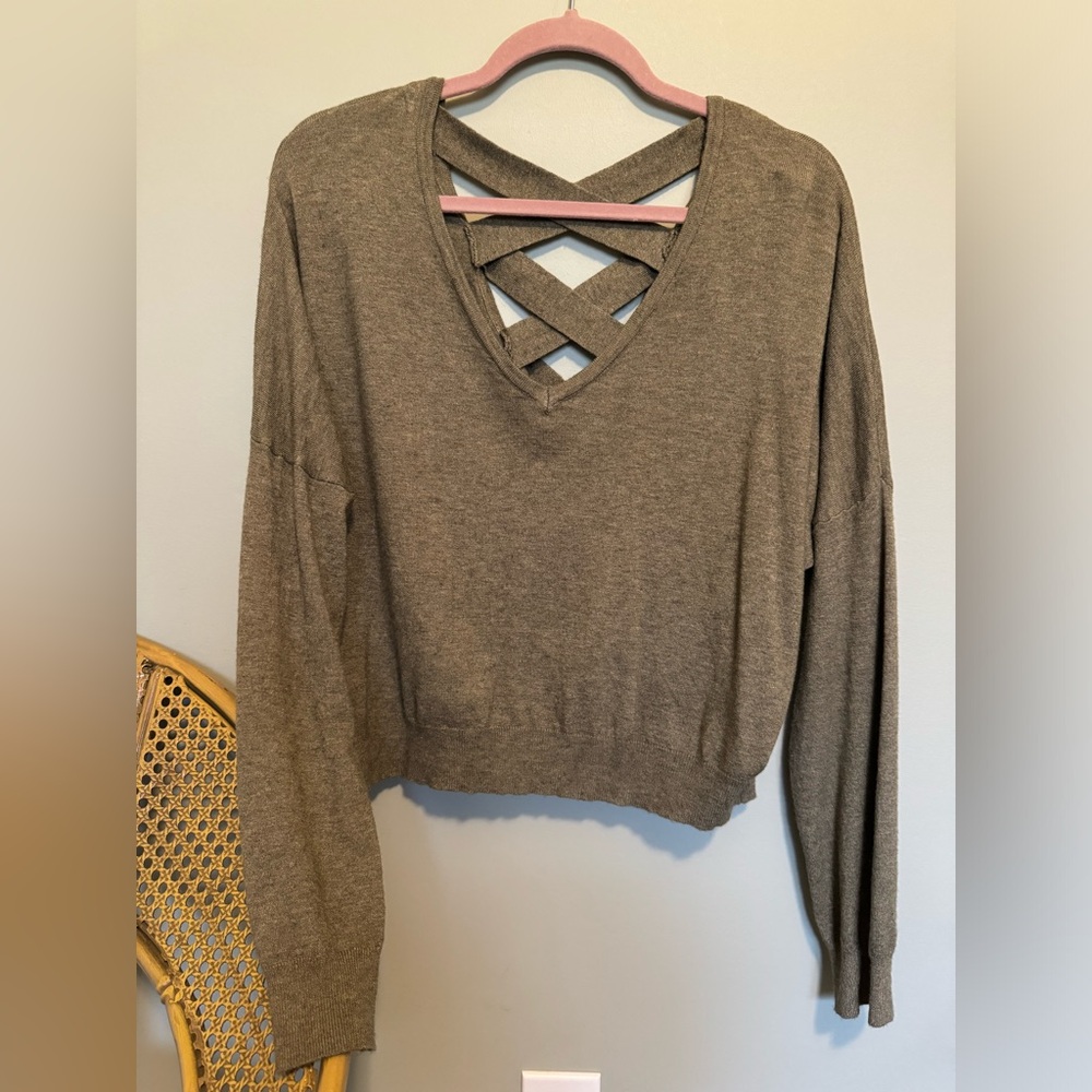 Lightweight heather green v-neck sweater with open back